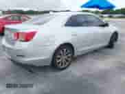 2014 Chevrolet Malibu LT with VIN 1G11E5SL8EF224463, listed as a IAAI auction lot 43100256 with 158,389 mi miles and . Bid and sale history available at DreamBid. Image 4.