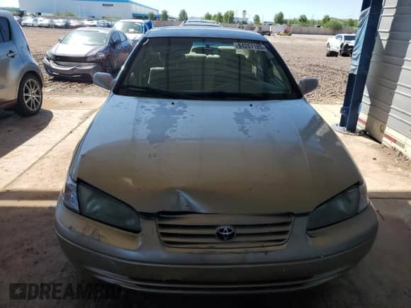 1999 Toyota Camry LE z VIN JT2BG28K4X0317756, wystawiony jako Copart lot #84267185 z przebiegiem 346 355 mil mil oraz Szkoda całkowita • Salvage title. Historia ofert i sprzedaży dostępna na DreamBid. Obrazek 5.