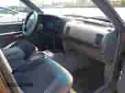 1996 Jeep Grand Cherokee Laredo z VIN 1J4GZ58Y2TC354076, wystawiony jako IAAI lot #42572842 z przebiegiem 172 282 mil mil oraz . Historia ofert i sprzedaży dostępna na DreamBid. Obrazek 5.