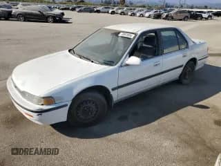 1993 Honda Accord LX z VIN JHMCB7651PC017612, wystawiony jako Copart lot #73041854 z przebiegiem 334 877 mil mil oraz Czysty tytuł • Clean title. Historia ofert i sprzedaży dostępna na DreamBid. Obrazek 1.