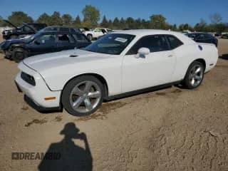 2013 Dodge Challenger SXT с VIN 2C3CDYAG4DH552022, выставлен на аукционе Copart как лот 84448305 с пробегом 94 322 миль миль и Списание • Salvage title. История ставок и продаж доступна на DreamBid. Изображение 1.