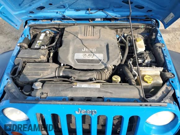 2012 Jeep Wrangler Sport с VIN 1C4AJWAG3CL144015, выставлен на аукционе Copart как лот 50969705 с пробегом 93 417 миль миль и Списание • Salvage title. История ставок и продаж доступна на DreamBid. Изображение 11.