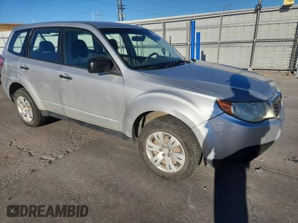 2010 Subaru Forester X with VIN JF2SH6AC7AH721594, listed as a Copart auction lot 80193205 with 191,820 mi miles and Salvage title. Bid and sale history available at DreamBid. Image 4.