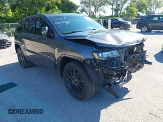 2020 Jeep Grand Cherokee Laredo E with VIN 1C4RJEAGXLC244965, listed as a IAAI auction lot 43026734 with 70,553 mi miles and . Bid and sale history available at DreamBid. Image 1.