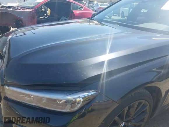 2020 BMW 7 Series 740i z VIN WBA7T2C07LGL17473, wystawiony jako IAAI lot #41970351 z przebiegiem 57 470 mil mil oraz . Historia ofert i sprzedaży dostępna na DreamBid. Obrazek 19.