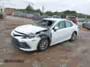 2023 Toyota Camry LE z VIN 4T1C11AKXPU770849, wystawiony jako IAAI lot #43338006 z przebiegiem 64 765 mil mil oraz . Historia ofert i sprzedaży dostępna na DreamBid. Obrazek 22.