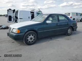 1994 Mercedes-Benz C 2.8L с VIN WDBHA28E5RF027599, выставлен на аукционе Copart как лот 86163345 с пробегом 295 024 миль миль и Списание • Salvage title. История ставок и продаж доступна на DreamBid. Изображение 1.