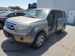 2010 Honda Pilot LX with VIN 5FNYF4H2XAB014666, listed as a Copart auction lot 58804695 with 216,948 mi miles and Salvage title. Bid and sale history available at DreamBid. Image 1.