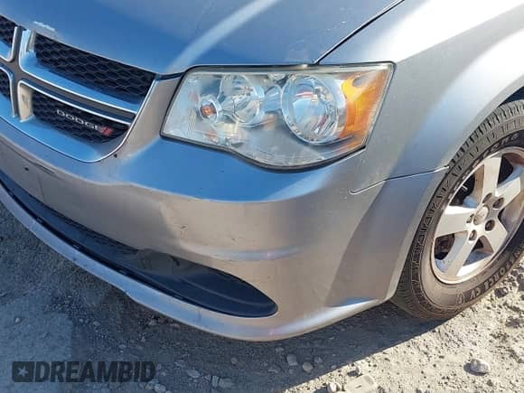 2013 Dodge Grand Caravan SXT with VIN 2C4RDGCG1DR580447, listed as a IAAI auction lot 43373907 with 265,396 mi miles and . Bid and sale history available at DreamBid. Image 14.