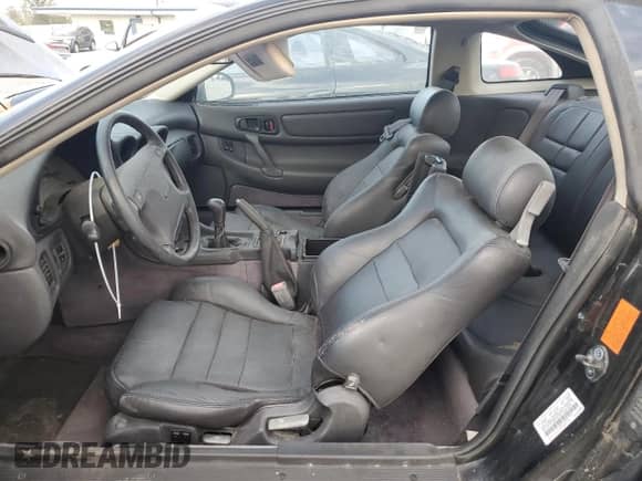 1991 Dodge Stealth with VIN JB3XE74C2MY017971, listed as a Copart auction lot 79442074 with 56,890 mi miles and Salvage title. Bid and sale history available at DreamBid. Image 7.