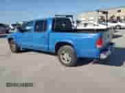 2002 Dodge Dakota SLT with VIN 1B7HL48N32S693817, listed as a Copart auction lot 52126605 with 238,782 mi miles and Salvage title. Bid and sale history available at DreamBid. Image 2.