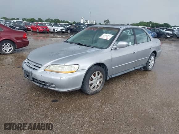 2002 Honda Accord SE with VIN 1HGCG567X2A175896, listed as a IAAI auction lot 42557502 with 213,229 mi miles and . Bid and sale history available at DreamBid. Image 2.