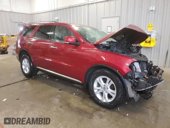 2013 Dodge Durango Crew with VIN 1C4RDJDG4DC660037, listed as a Copart auction lot 87818265 with Not provided miles and Salvage title. Bid and sale history available at DreamBid. Image 4.