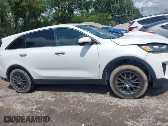 2020 Kia Sorento LX with VIN 5XYPG4A52LG676525, listed as a IAAI auction lot 42759112 with 107,868 mi miles and . Bid and sale history available at DreamBid. Image 13.