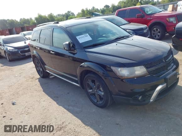 2019 Dodge Journey Crossroad with VIN 3C4PDCGG2KT803373, listed as a IAAI auction lot 43221708 with 184,529 mi miles and . Bid and sale history available at DreamBid. Image 1.