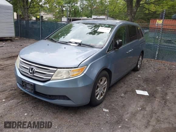 2013 Honda Odyssey EX с VIN 5FNRL5H47DB004640, выставлен на аукционе IAAI как лот 42953700 с пробегом 99 716 миль миль и . История ставок и продаж доступна на DreamBid. Изображение 2.