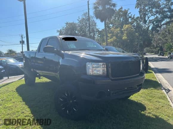 2009 GMC Sierra 1500 z VIN 2GTEC290291129595, wystawiony jako Copart lot #90131885 z przebiegiem 124 544 mil mil oraz Czysty tytuł • Clean title. Historia ofert i sprzedaży dostępna na DreamBid. Obrazek 1.