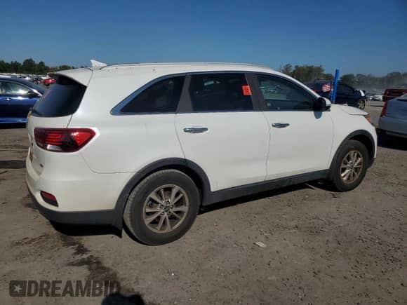 2019 Kia Sorento L с VIN 5XYPG4A33KG515534, выставлен на аукционе Copart как лот 80626415 с пробегом 120 024 миль миль и Списание • Salvage title. История ставок и продаж доступна на DreamBid. Изображение 3.
