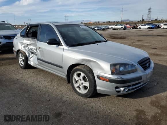 2004 Hyundai Elantra GT z VIN KMHDN56D84U130497, wystawiony jako Copart lot #49121055 z przebiegiem 96 046 mil mil oraz Szkoda całkowita • Salvage title. Historia ofert i sprzedaży dostępna na DreamBid. Obrazek 4.