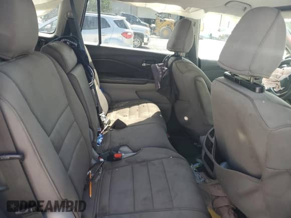 2016 Honda Pilot LX z VIN 5FNYF6H17GB024521, wystawiony jako Copart lot #65635625 z przebiegiem 168 863 mil mil oraz Szkoda całkowita • Salvage title. Historia ofert i sprzedaży dostępna na DreamBid. Obrazek 10.