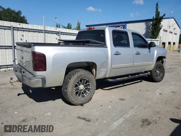 2013 Chevrolet Silverado 1500 LT с VIN 3GCPKSEA8DG111046, выставлен на аукционе Copart как лот 80188345 с пробегом 191 643 миль миль и Списание • Salvage title. История ставок и продаж доступна на DreamBid. Изображение 3.