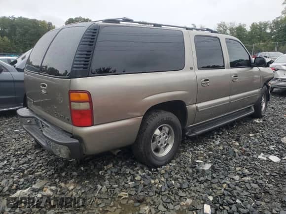 2001 Chevrolet Suburban LS with VIN 3GNEC16T91G165893, listed as a Copart auction lot 72577224 with 270,842 mi miles and Salvage title. Bid and sale history available at DreamBid. Image 3.