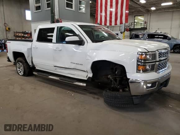2015 Chevrolet Silverado 1500 LT с VIN 3GCUKREC1FG465426, выставлен на аукционе Copart как лот 82335245 с пробегом 188 694 миль миль и Списание • Salvage title. История ставок и продаж доступна на DreamBid. Изображение 4.