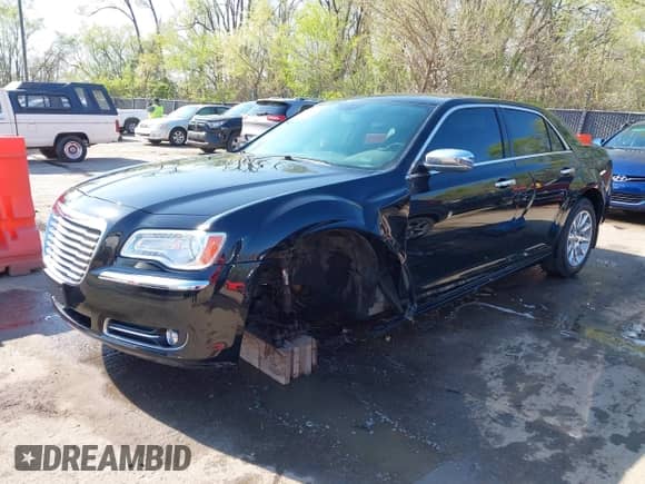 2014 Chrysler 300 C with VIN 2C3CCAET6EH171758, listed as a IAAI auction lot 41991077 with 101,263 mi miles and . Bid and sale history available at DreamBid. Image 2.