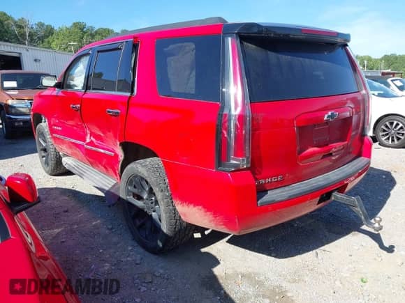 2019 Chevrolet Tahoe LS with VIN 1GNSKAKC1KR197010, listed as a IAAI auction lot 42718151 with 117,781 mi miles and . Bid and sale history available at DreamBid. Image 3.