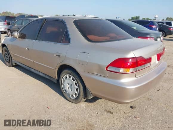 2001 Honda Accord LX with VIN 1HGCG56401A148713, listed as a IAAI auction lot 43145893 with 170,024 mi miles and . Bid and sale history available at DreamBid. Image 3.