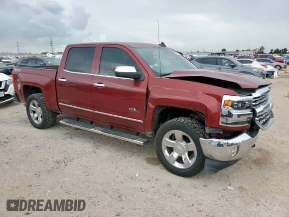 2017 Chevrolet Silverado 1500 LTZ with VIN 3GCUKSEC1HG353039, listed as a Copart auction lot 64611015 with 123,210 mi miles and Salvage title. Bid and sale history available at DreamBid. Image 4.