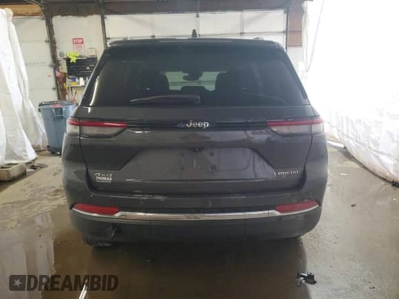 2022 Jeep Grand Cherokee Altitude with VIN 1C4RJHAG1N8615888, listed as a Copart auction lot 46252195 with 25,078 mi miles and Salvage title. Bid and sale history available at DreamBid. Image 6.