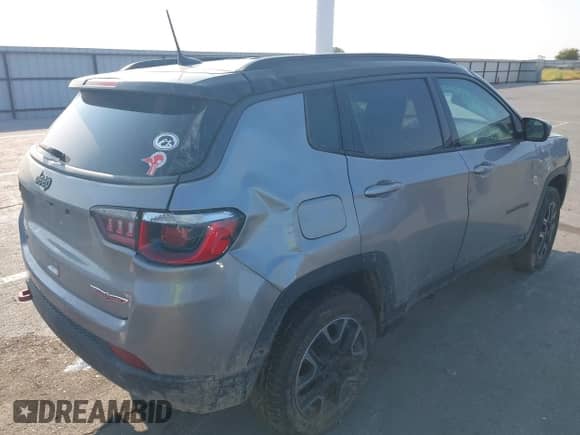 2019 Jeep Compass Trailhawk with VIN 3C4NJDDB2KT722257, listed as a IAAI auction lot 43191333 with 111,975 mi miles and . Bid and sale history available at DreamBid. Image 4.