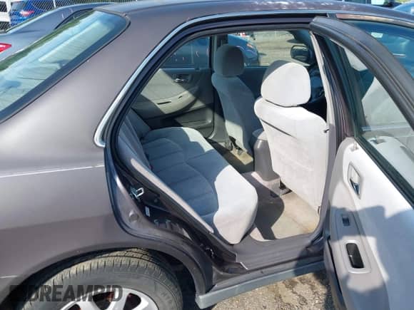 1999 Honda Accord LX with VIN 1HGCG6654XA100896, listed as a IAAI auction lot 42613354 with 154,176 mi miles and . Bid and sale history available at DreamBid. Image 8.