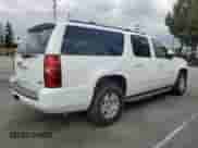2010 Chevrolet Suburban LT z VIN 1GNUCJE05AR210539, wystawiony jako Copart lot #54875855 z przebiegiem 166 305 mil mil oraz Czysty tytuł • Clean title. Historia ofert i sprzedaży dostępna na DreamBid. Obrazek 3.