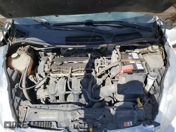 2011 Ford Fiesta SE z VIN 3FADP4BJ2BM239601, wystawiony jako Copart lot #70484235 z przebiegiem 145 671 mil mil oraz Szkoda całkowita • Salvage title. Historia ofert i sprzedaży dostępna na DreamBid. Obrazek 11.