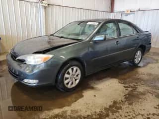 2003 Toyota Camry XLE with VIN 4T1BE30K43U704577, listed as a Copart auction lot 87444445 with 205,977 mi miles and Salvage title. Bid and sale history available at DreamBid. Image 1.