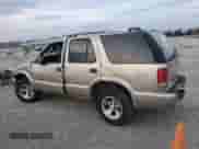 2003 Chevrolet Blazer LS с VIN 1GNCS13X53K148585, выставлен на аукционе Copart как лот 82339174 с пробегом 262 249 миль миль и Списание • Salvage title. История ставок и продаж доступна на DreamBid. Изображение 2.