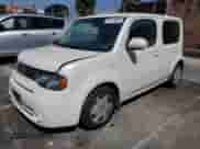 2010 Nissan Cube S Krom Edition z VIN JN8AZ2KR3AT156488, wystawiony jako Copart lot #69114295 z przebiegiem 90 461 mil mil oraz Szkoda całkowita • Salvage title. Historia ofert i sprzedaży dostępna na DreamBid. Obrazek 1.