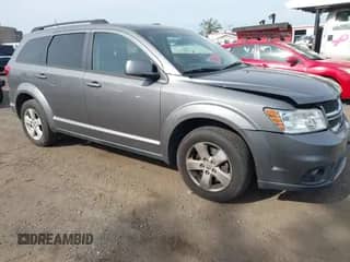 2012 Dodge Journey SXT z VIN 3C4PDCBG8CT332984, wystawiony jako IAAI lot #43333885 z przebiegiem 130 227 mil mil oraz . Historia ofert i sprzedaży dostępna na DreamBid. Obrazek 1.