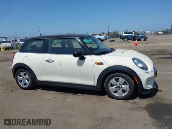 2017 MINI Hardtop Cooper with VIN WMWXP5C39H2D71459, listed as a IAAI auction lot 42111245 with 97,759 mi miles and . Bid and sale history available at DreamBid. Image 13.