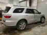 2011 Dodge Durango Crew с VIN 1D4RE4GG3BC638590, выставлен на аукционе Copart как лот 85089465 с пробегом 166 145 миль миль и Списание • Salvage title. История ставок и продаж доступна на DreamBid. Изображение 3.