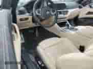 2023 BMW 4 Series 430i xDrive with VIN WBA43AT08PCM90476, listed as a Copart auction lot 50727785 with 11,677 mi miles and Salvage title. Bid and sale history available at DreamBid. Image 8.