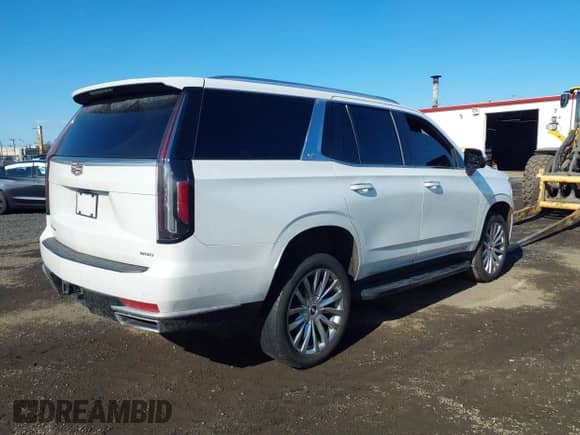 2021 Cadillac Escalade Premium Luxury with VIN 1GYS4BKLXMR394649, listed as a IAAI auction lot 41474731 with 85,268 mi miles and . Bid and sale history available at DreamBid. Image 4.