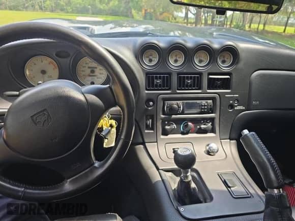 2000 Dodge Viper RT/10 with VIN 1B3ER65E9YV604682, listed as a Copart auction lot 60898085 with 56,029 mi miles and Clean title. Bid and sale history available at DreamBid. Image 9.
