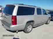 2007 Chevrolet Suburban LT with VIN 3GNFC16057G186159, listed as a IAAI auction lot 43593265 with 166,801 mi miles and . Bid and sale history available at DreamBid. Image 4.