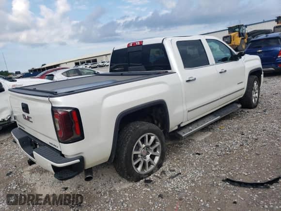 2018 GMC Sierra 1500 Denali z VIN 3GTP1PEC9JG510867, wystawiony jako Copart lot #65768565 z przebiegiem 50 540 mil mil oraz Szkoda całkowita • Salvage title. Historia ofert i sprzedaży dostępna na DreamBid. Obrazek 3.