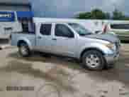 2007 Nissan Frontier SE z VIN 1N6AD09U87C456591, wystawiony jako Copart lot #63693815 z przebiegiem 209 159 mil mil oraz Szkoda całkowita • Salvage title. Historia ofert i sprzedaży dostępna na DreamBid. Obrazek 4.