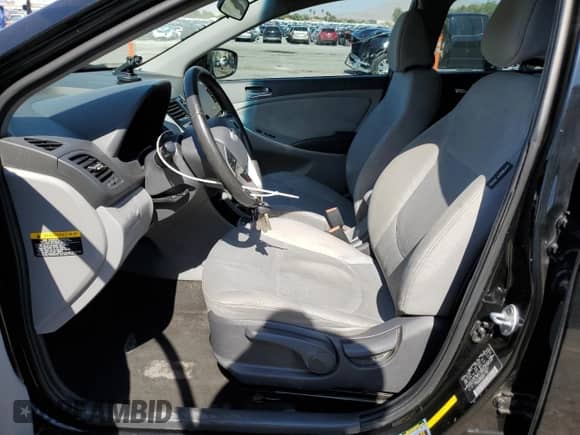 2014 Hyundai Accent SE с VIN KMHCU5AE6EU189547, выставлен на аукционе Copart как лот 62954005 с пробегом Не указан миль и Списание • Salvage title. История ставок и продаж доступна на DreamBid. Изображение 7.