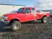 1996 Ford F-150 with VIN 1FTEX14N7TKA17710, listed as a Copart auction lot 76341824 with 215,390 mi miles and Salvage title. Bid and sale history available at DreamBid. Image 1.